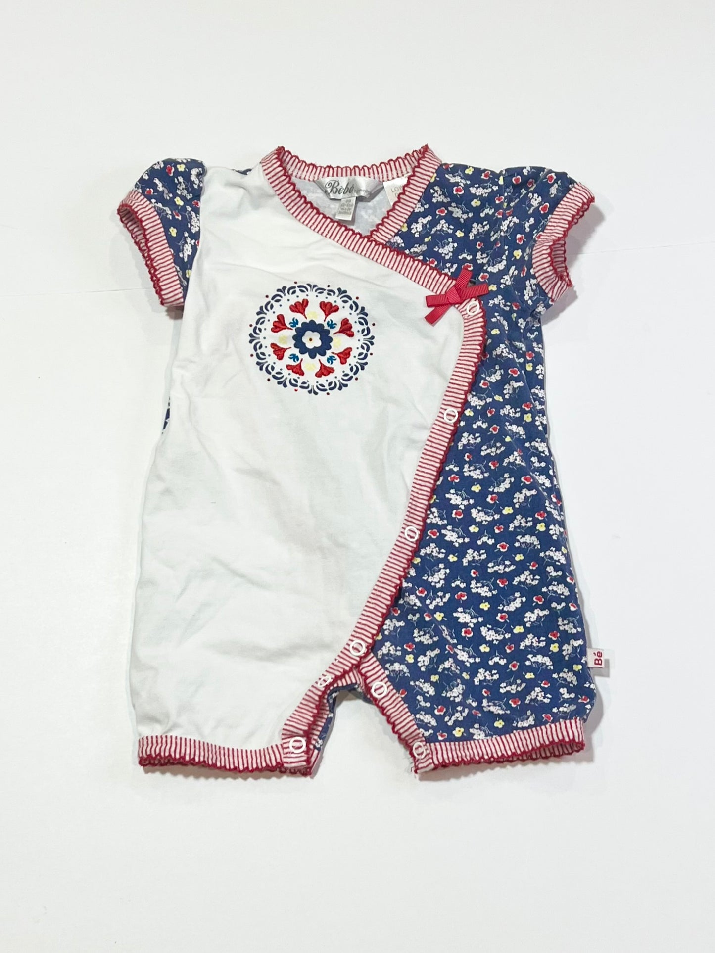 Floral corss-over romper - Size 00