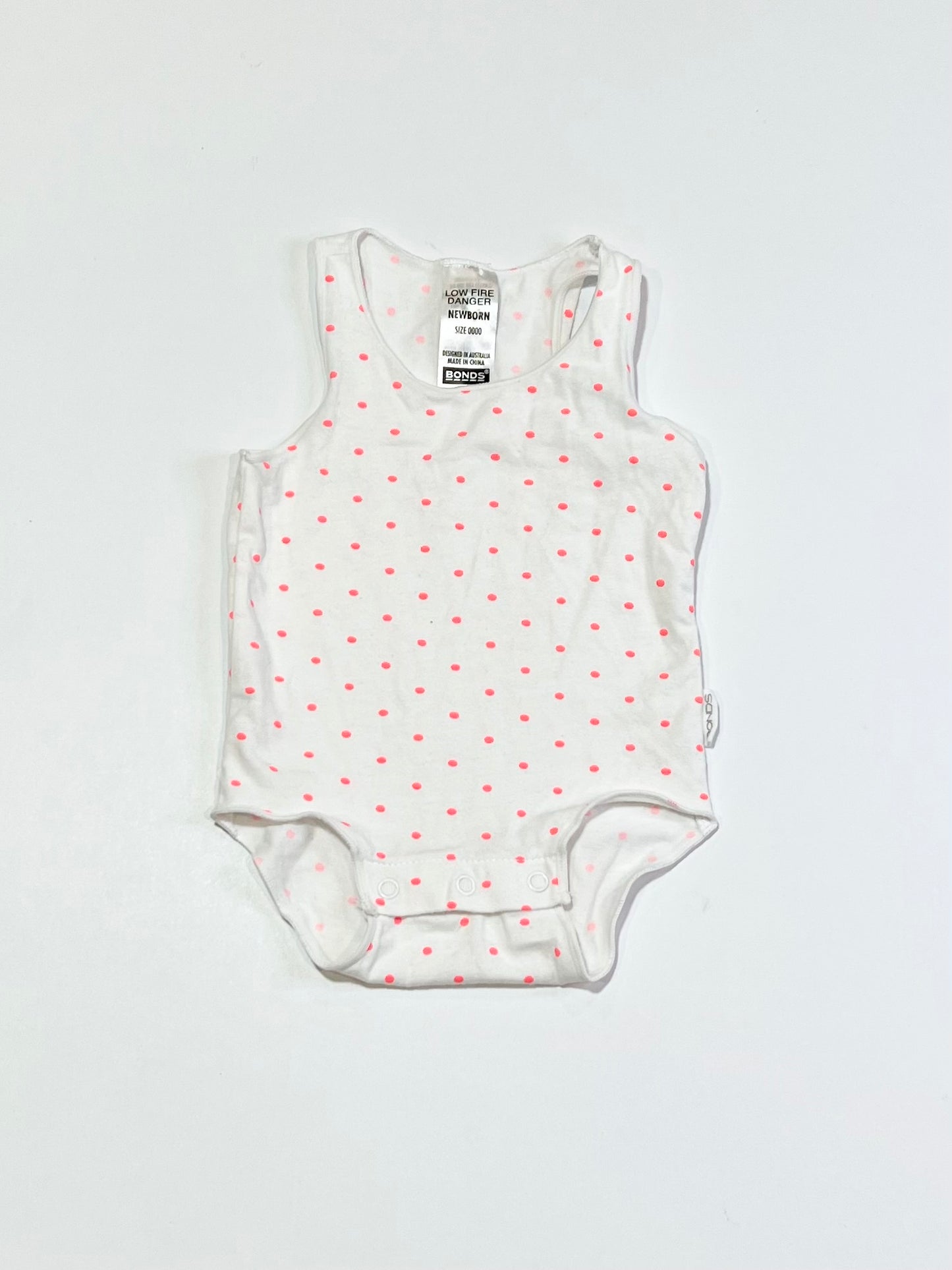 Pink spotty bodysuit - Size 0000