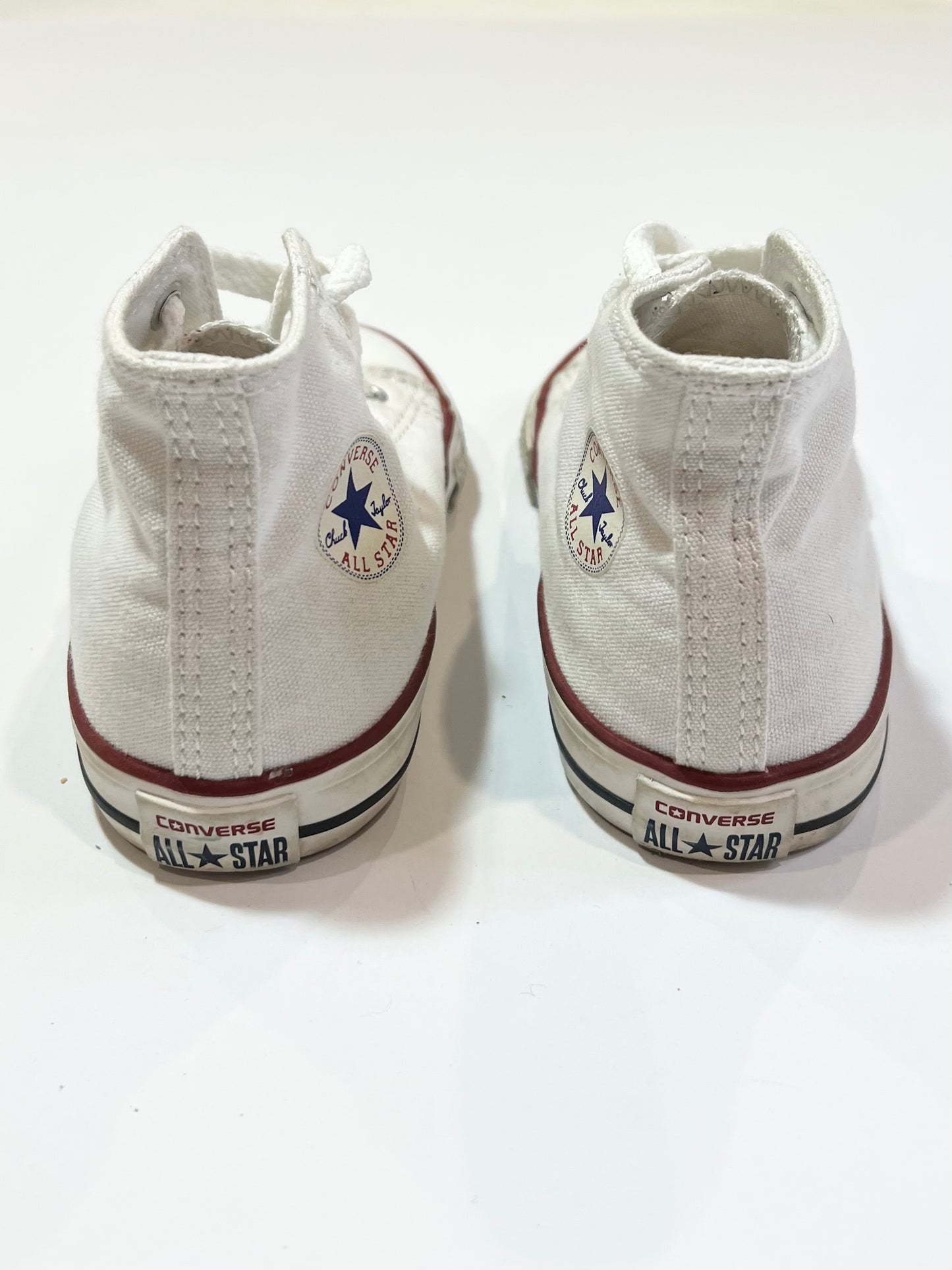 White Hi-top Chuck Taylors - Size US5