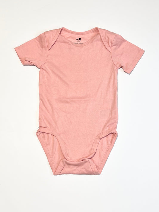 Pink ribbed bodysuit - Size 2
