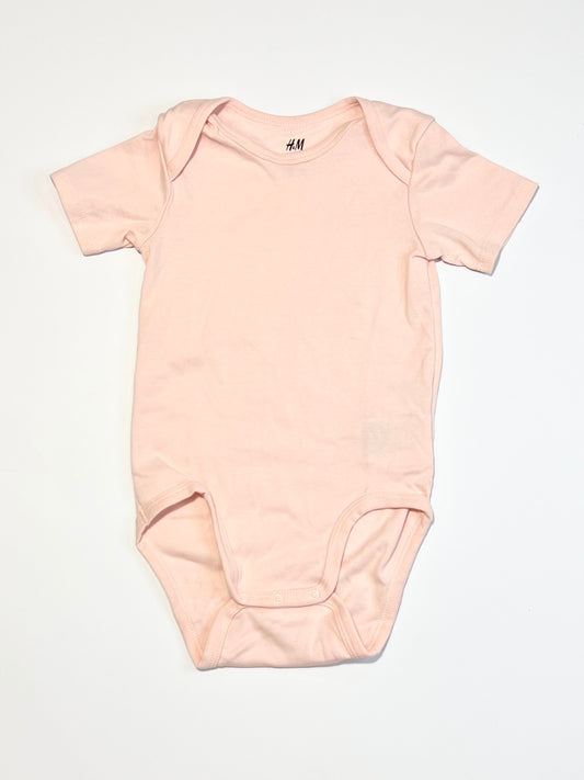 Pink ribbed bodysuit - Size 2