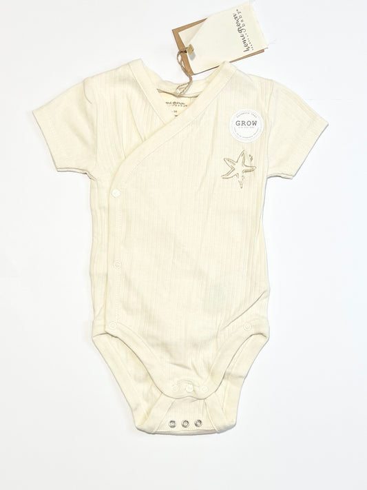 Ribbed bodysuit brand new - Size 6-9 months