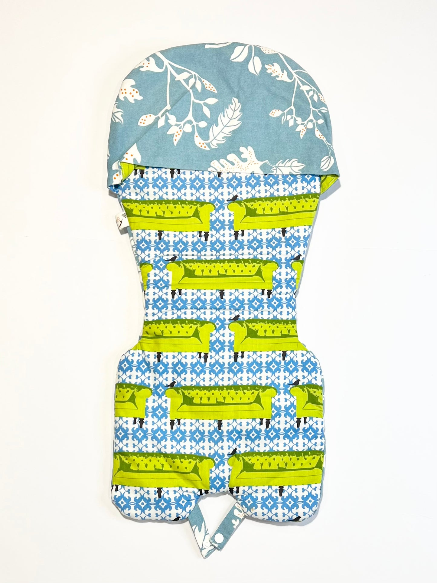 Reversible high chair cushion