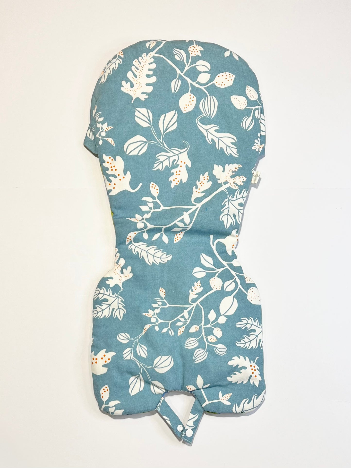 Reversible high chair cushion