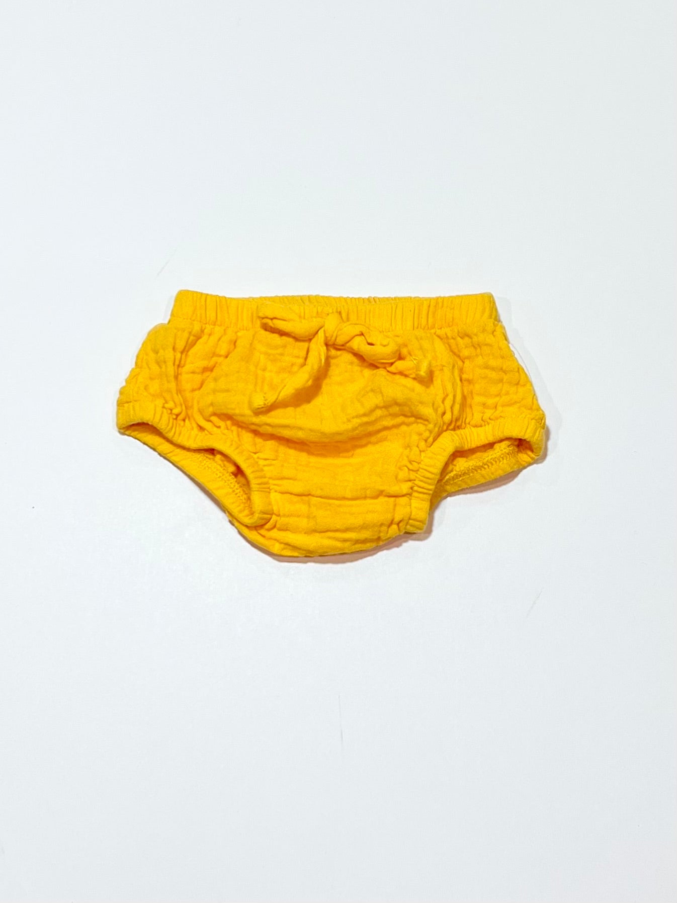 Yellow nappy cover - Size 0000