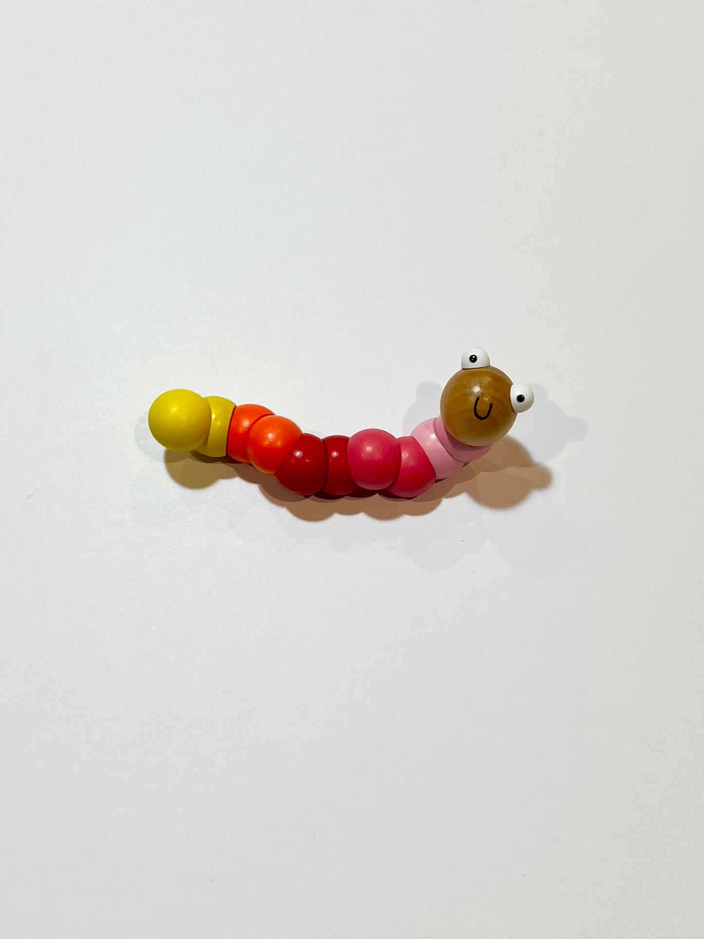 Jointed wooden worm toy