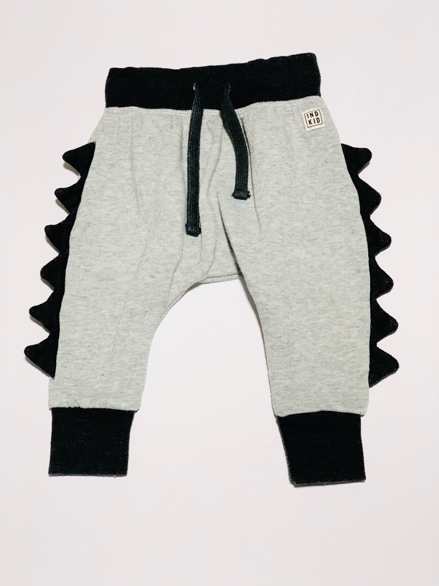 Grey dinosaur trackies - Size 0