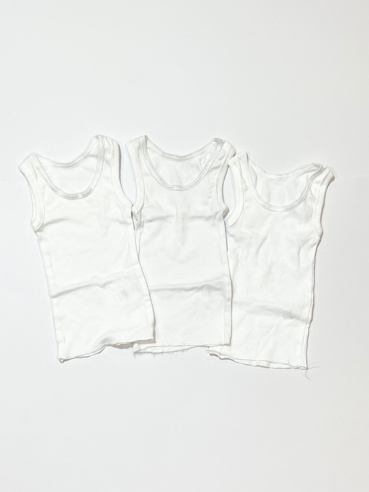3 x white singlets - Size 0000