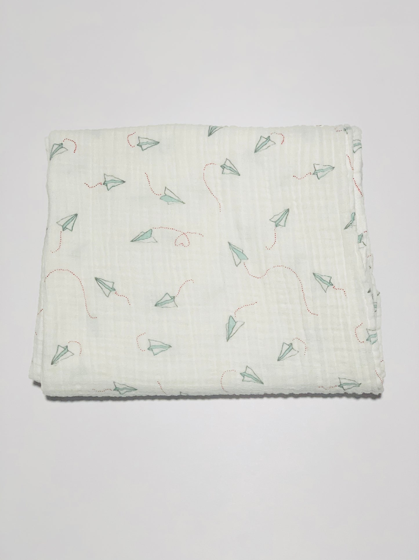 Paper planes cotton muslin wrap