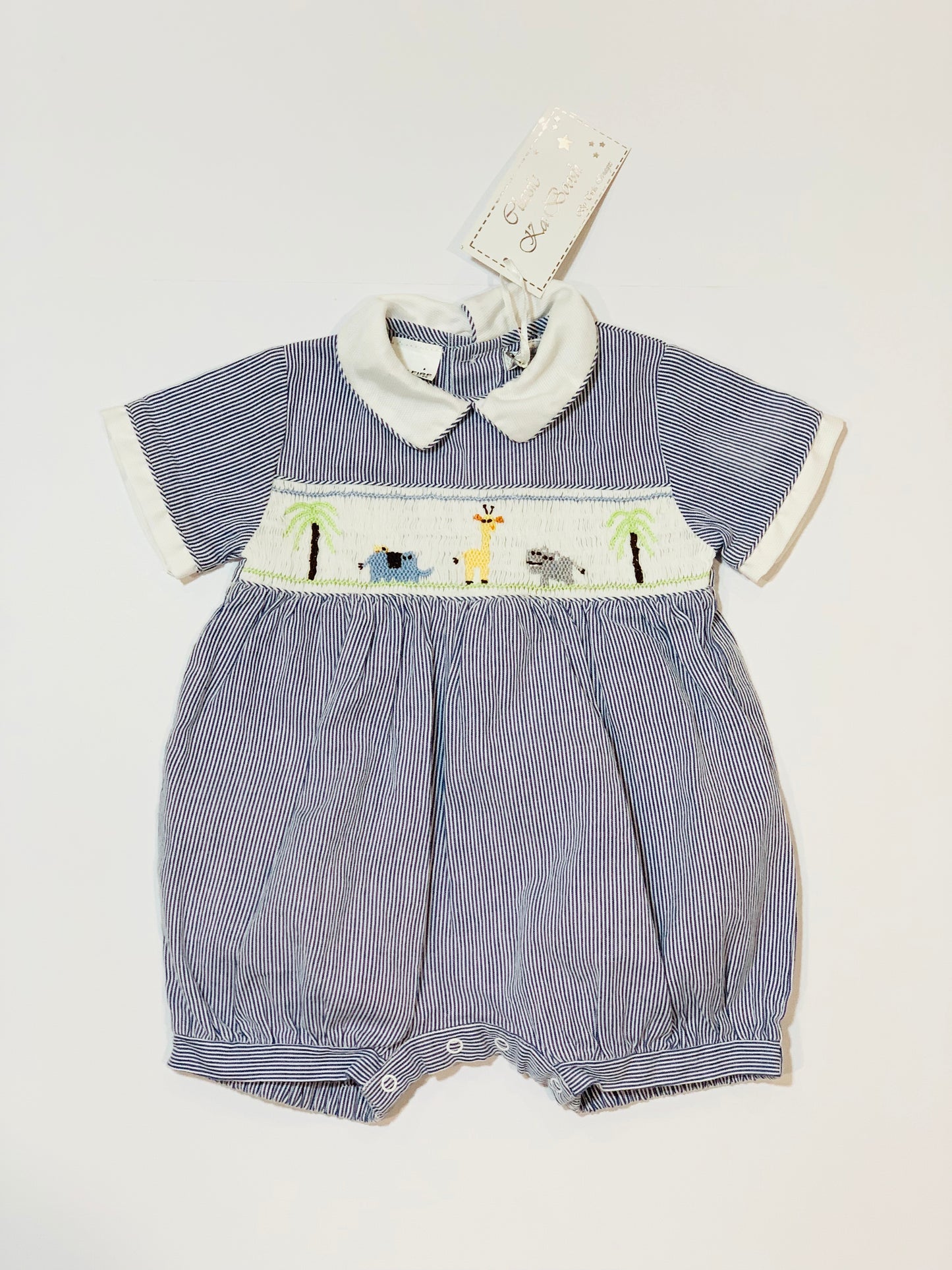 Smocked romper brand new - Size 00