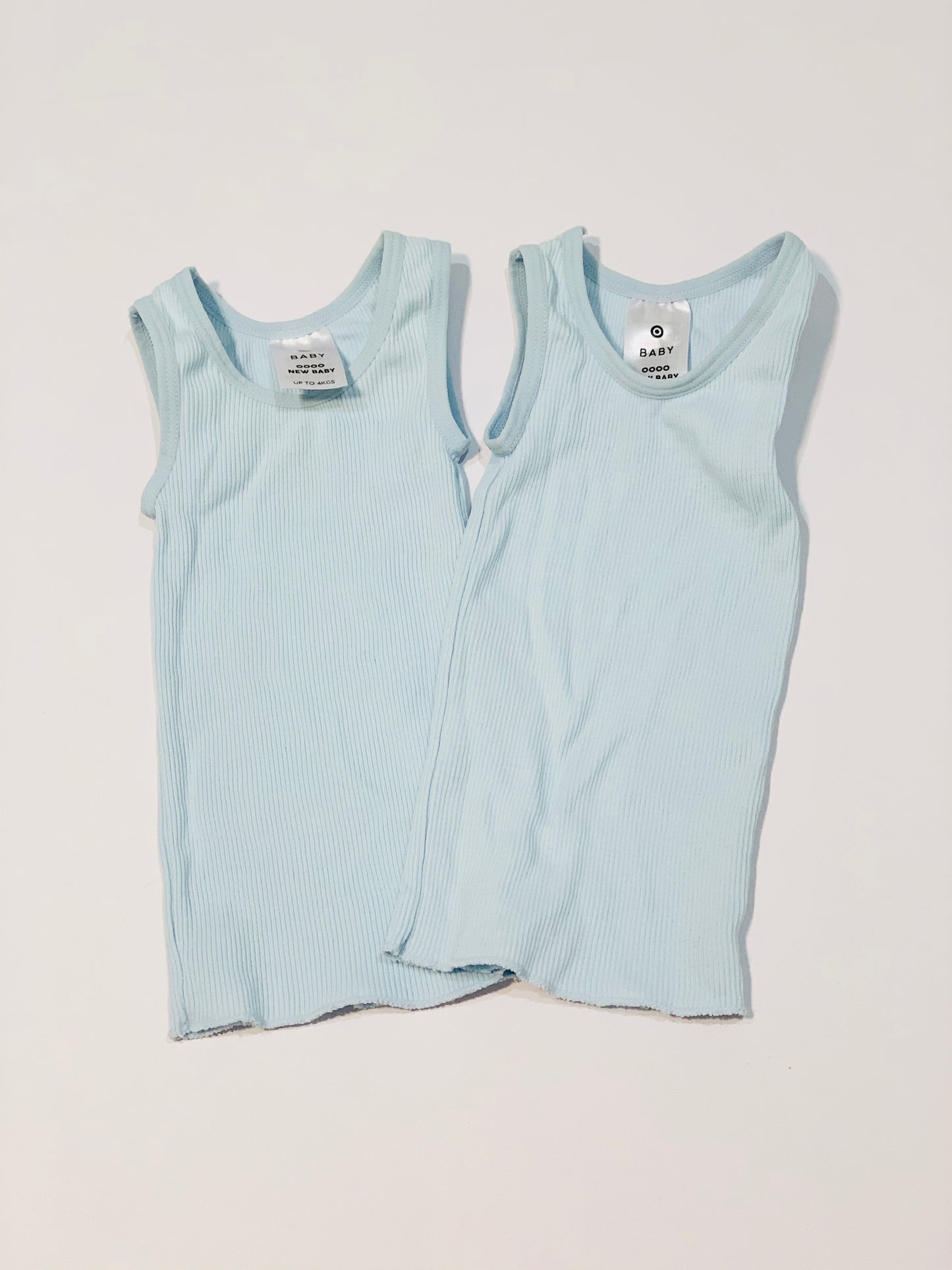 2 x blue singlets - Size 0000