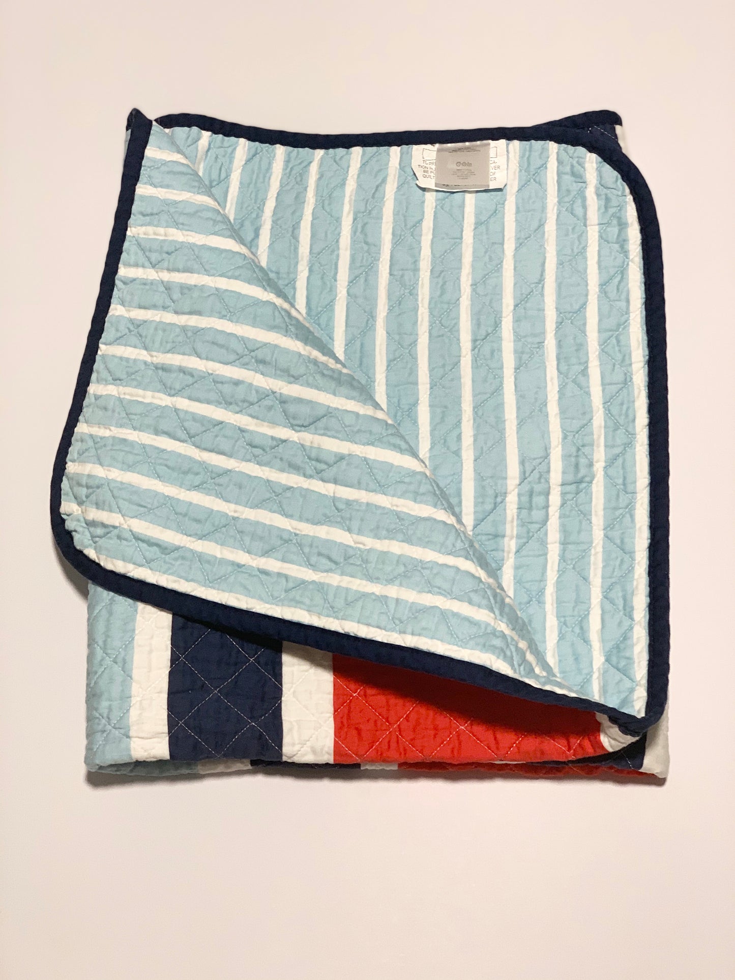 Striped quilted cot coverlet