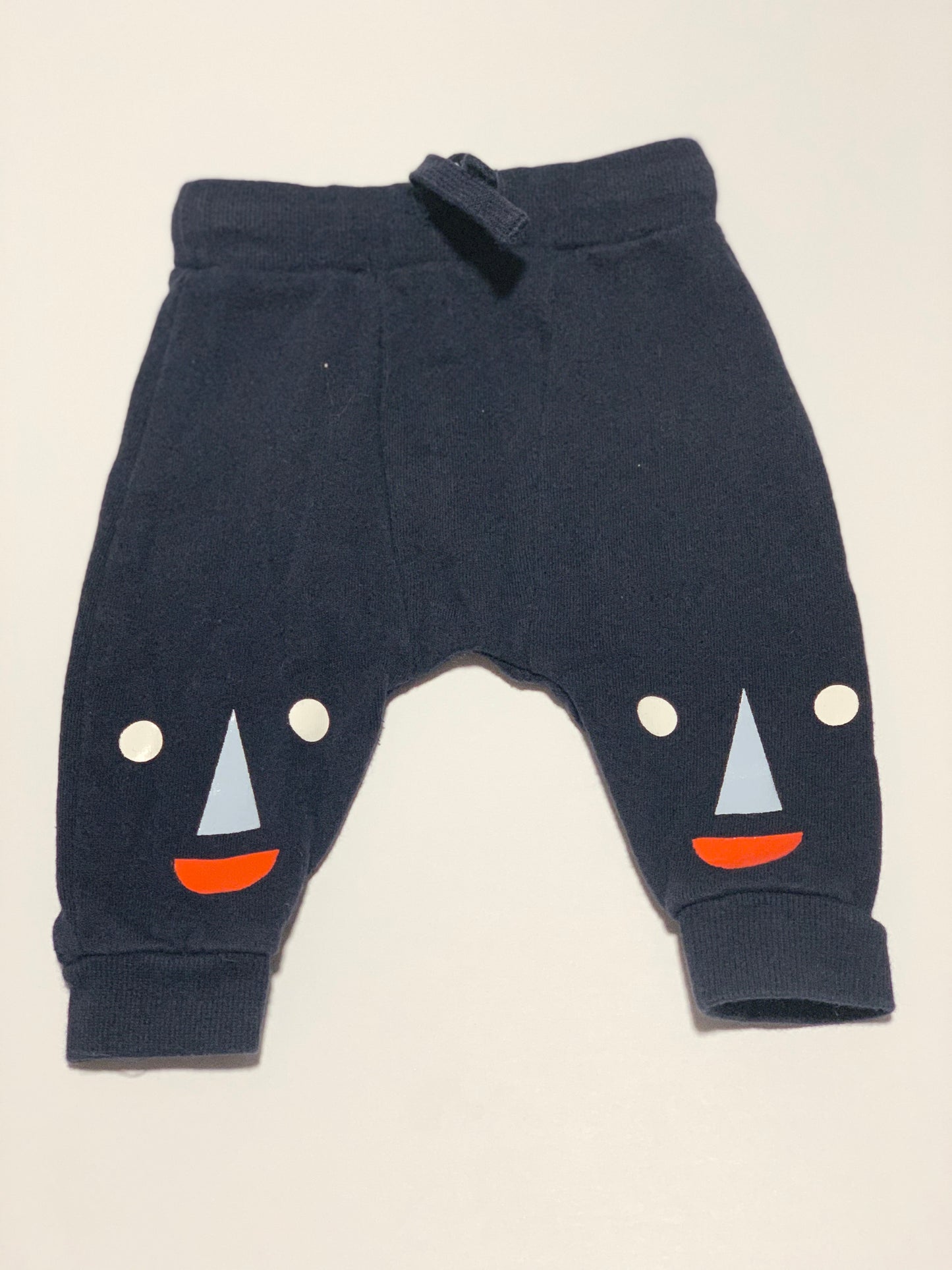 Smiley face pants - Size 000