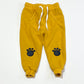 Yellow paw print trackies - Size 1