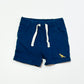 Blue dinosaur shorts - Size 6-9 months