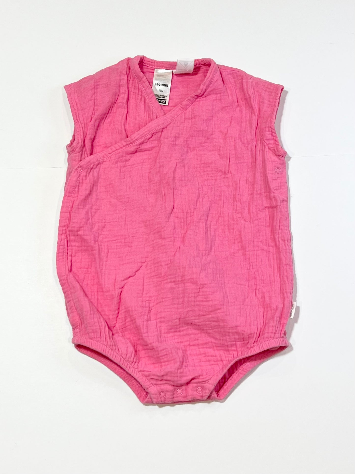 Pink cross-over romper - Size 2