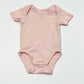Pink ribbed bodysuit - Size 4-6 months
