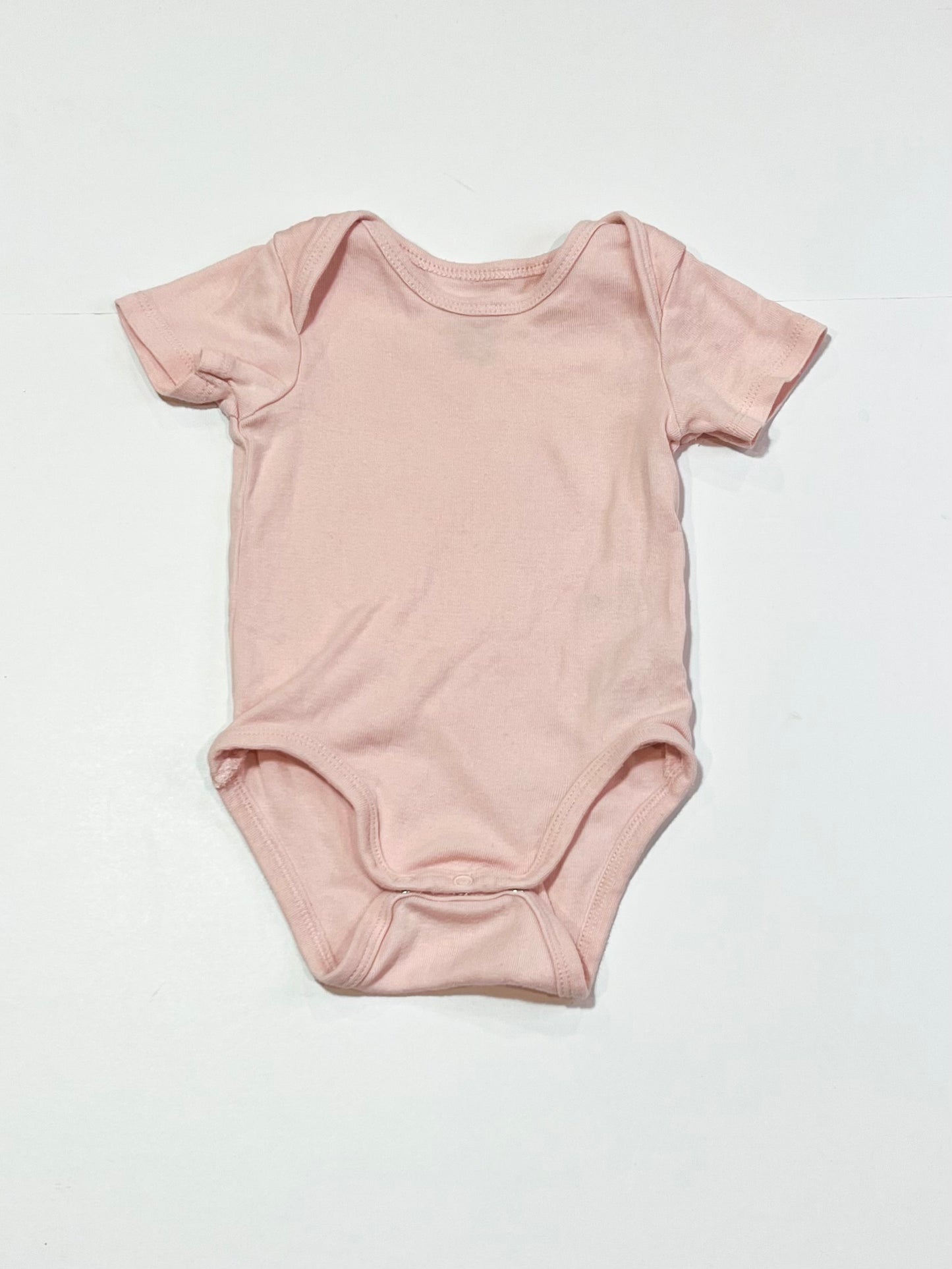 Pink ribbed bodysuit - Size 4-6 months
