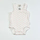Pink spotty bodysuit - Size 0000