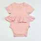 Pink ruffle bodysuit - Size 0000