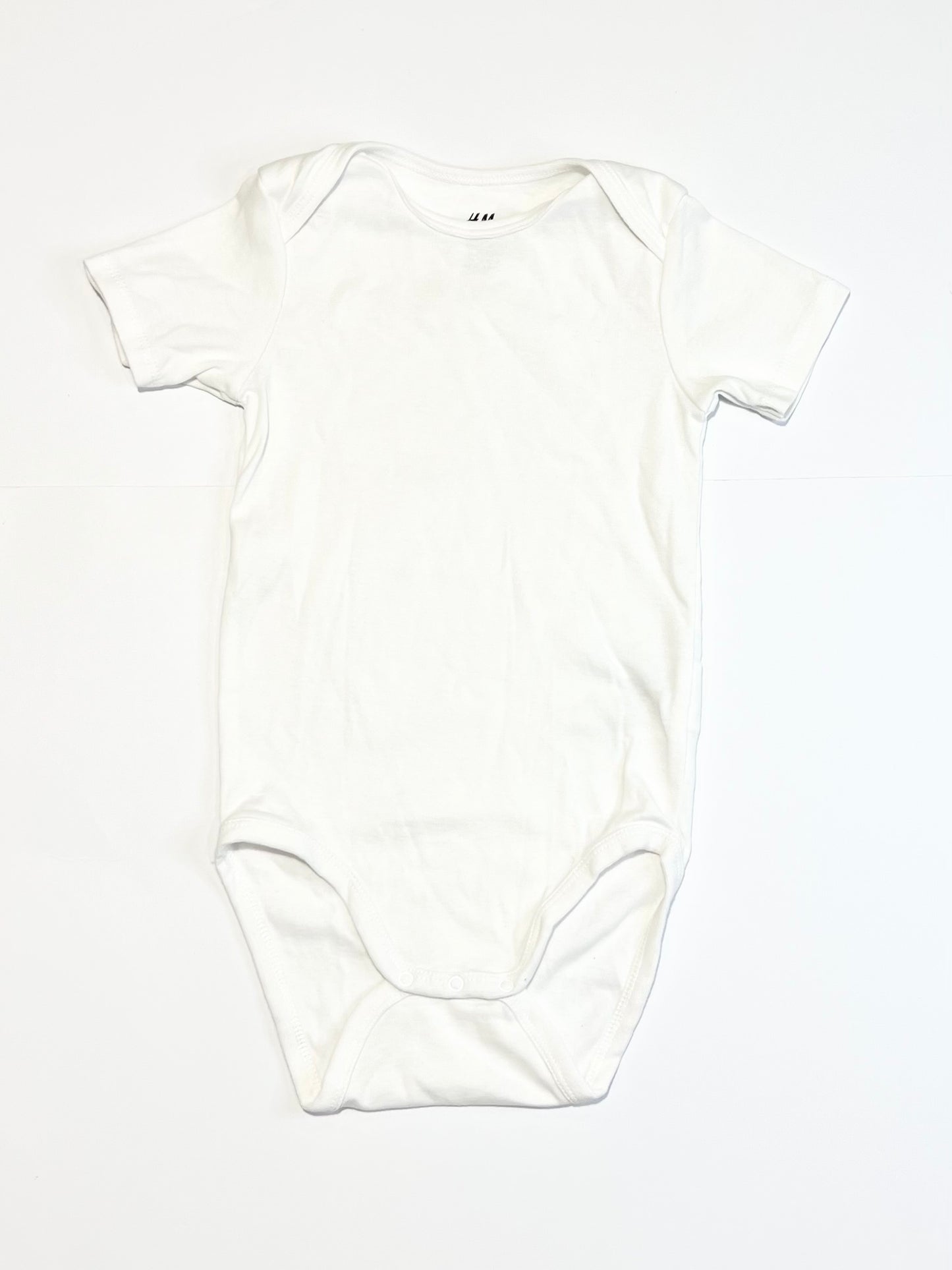 Ribbed white bodysuit - Size 2-3