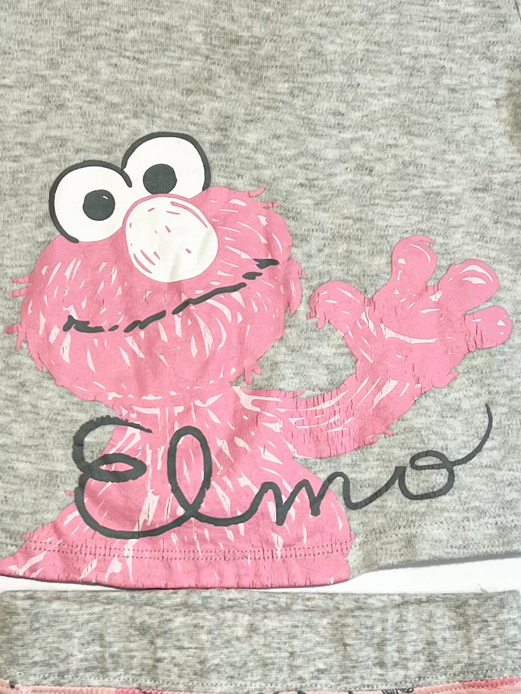 Pink Elmo pyjamas - Size 0