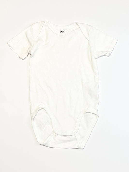 Ribbed white bodysuit - Size 2-3