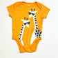 Orange giraffes bodysuit - Size 00