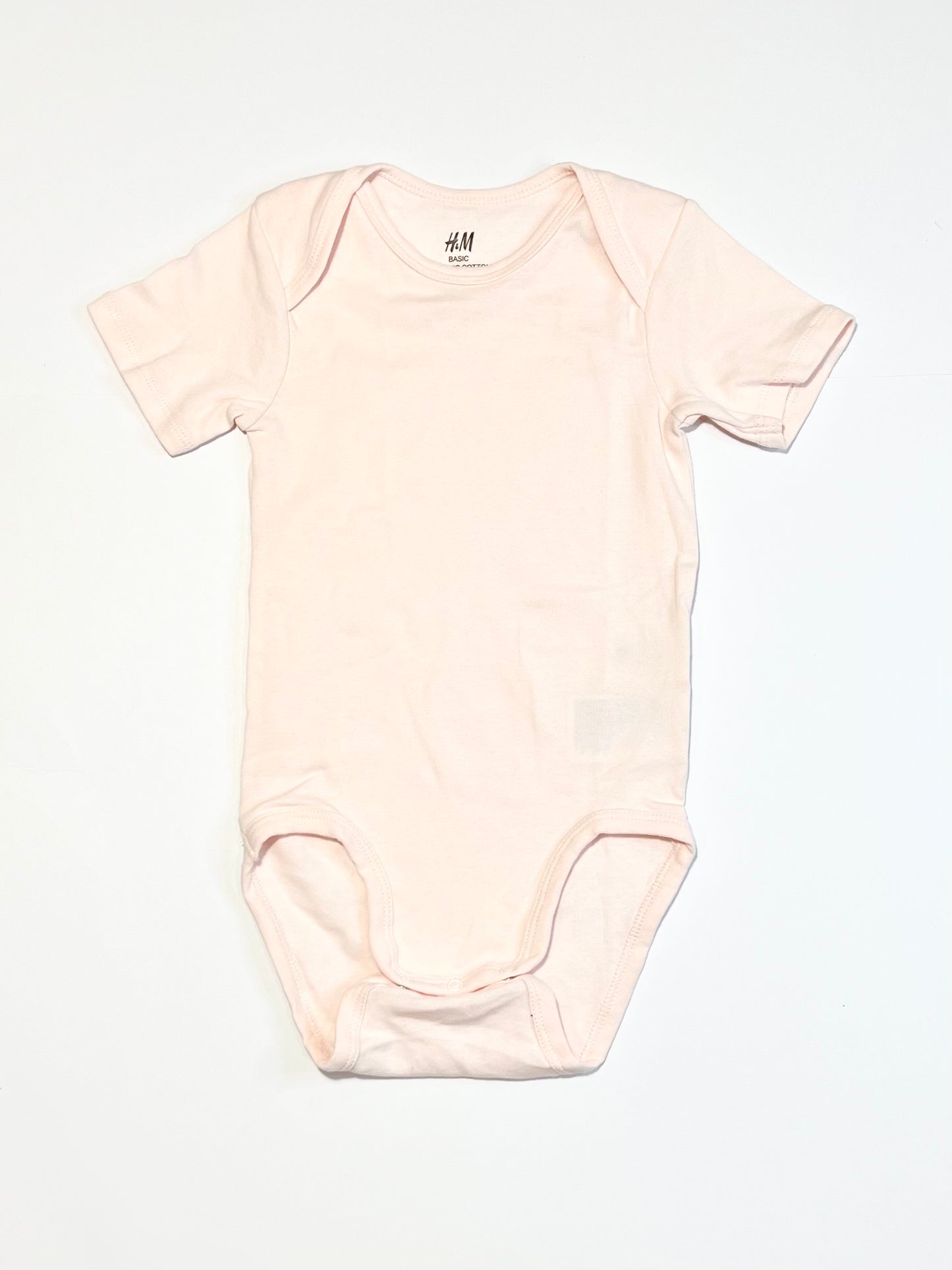 Pink ribbed bodysuit - Size 2