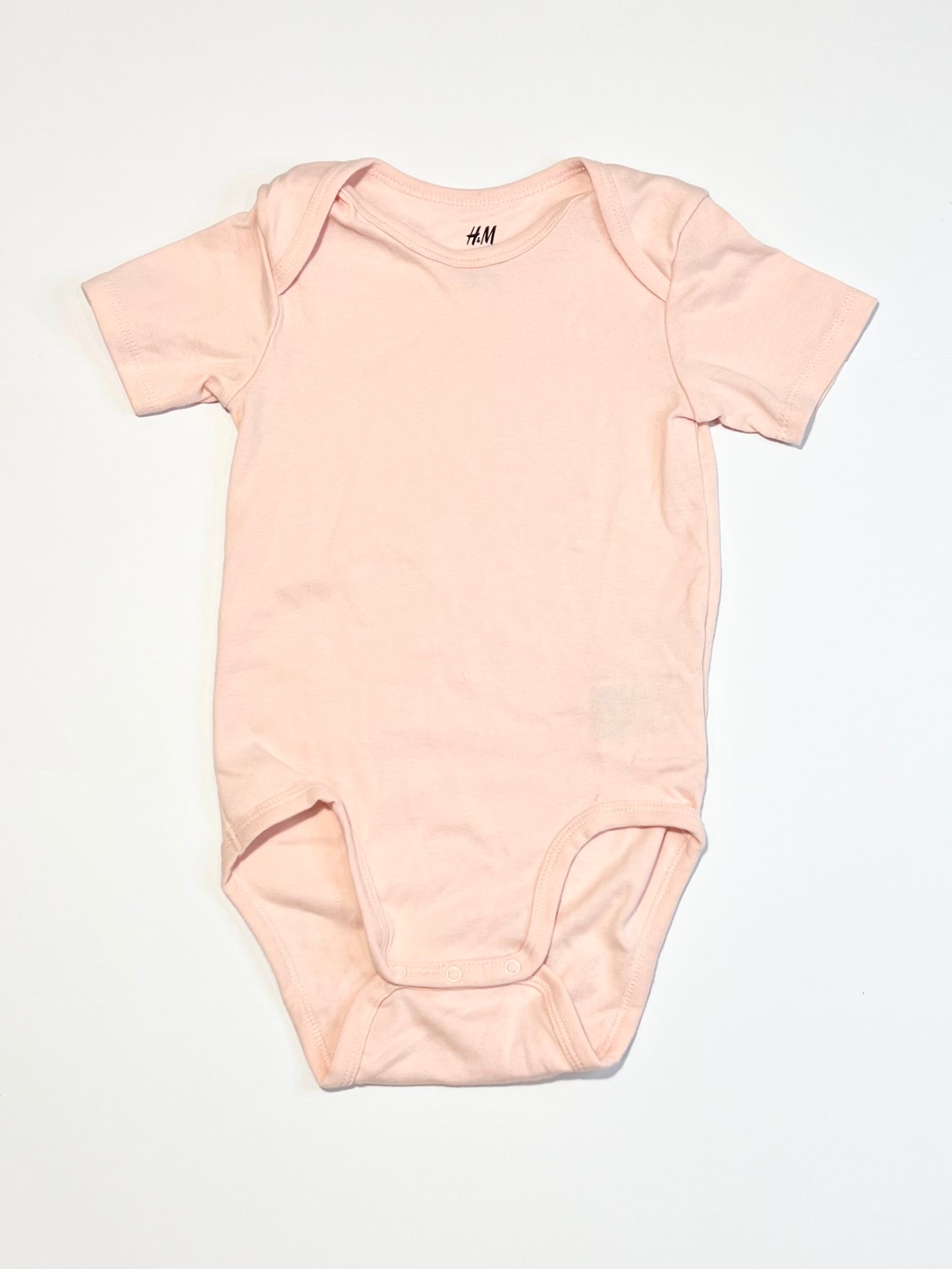 Pink ribbed bodysuit - Size 2