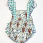 Floral cows ruffle romper - Size 2