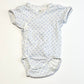 Spotty cross-over bodysuit - Size 2-4 months