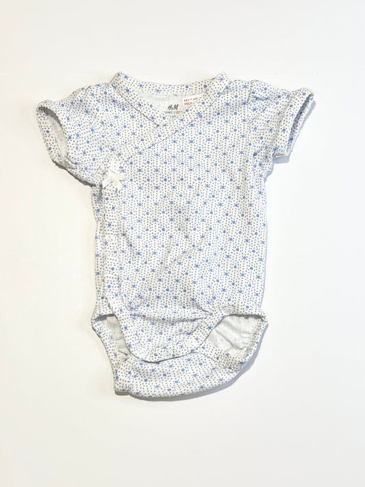 Spotty cross-over bodysuit - Size 2-4 months