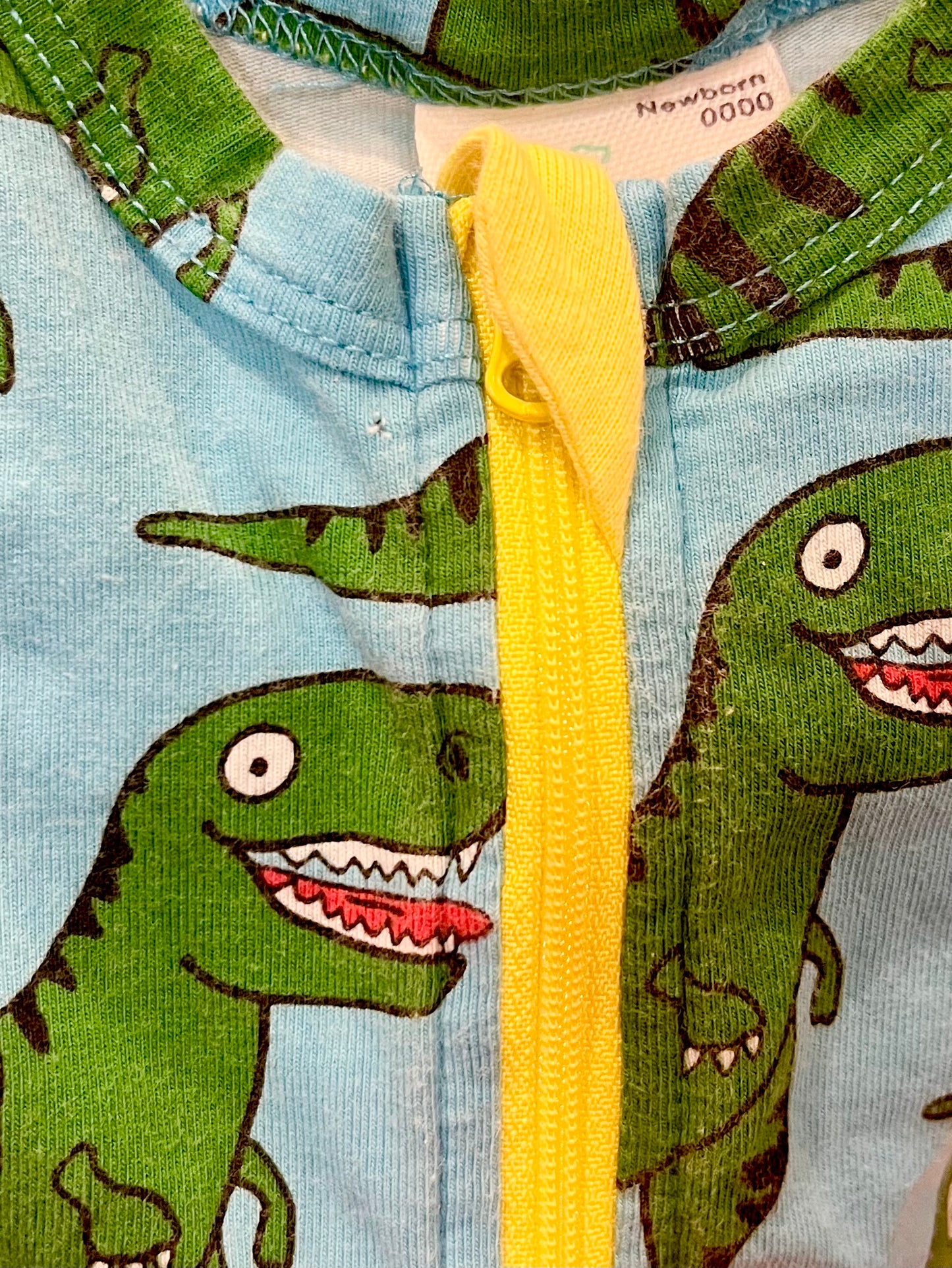 Dinosaurs zip romper - Size 0000