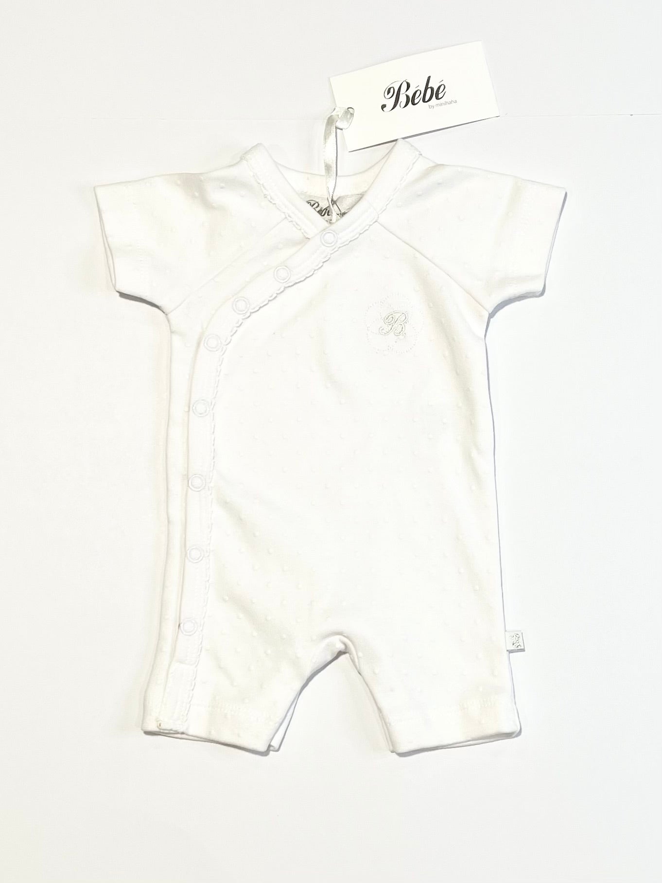 White spotty romper brand new - Size 00000