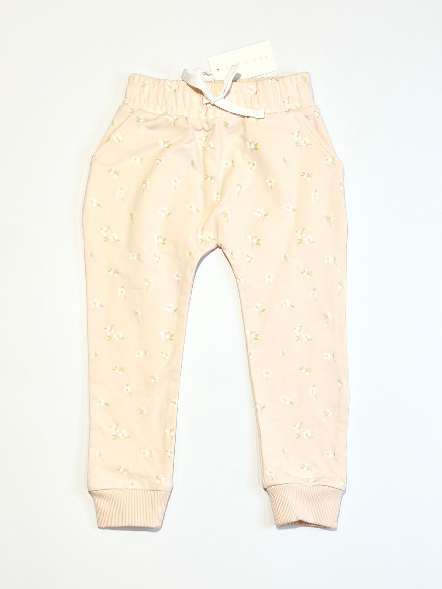 Floral track pants brand new - Size 4