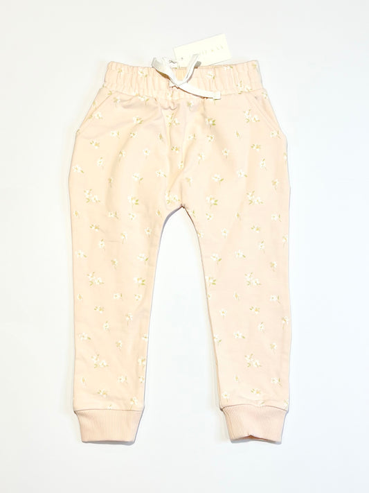 Floral track pants brand new - Size 4