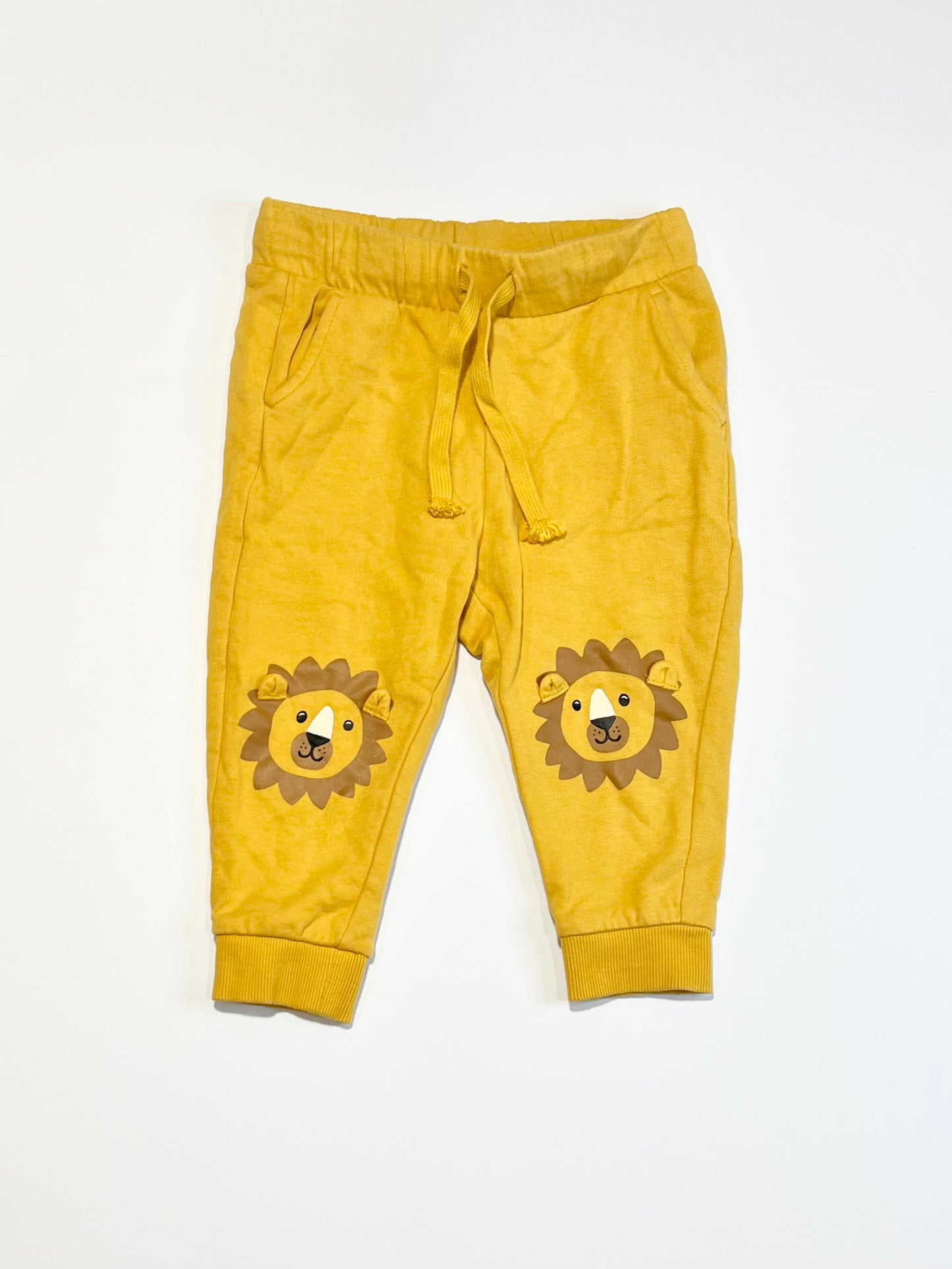 Yellow lion trackies - Size 9-12 months