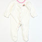 Pink spotty onesie - Size 0000
