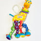 Colourful giraffe pram toy