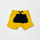 Yellow dino shorts - Size 0000
