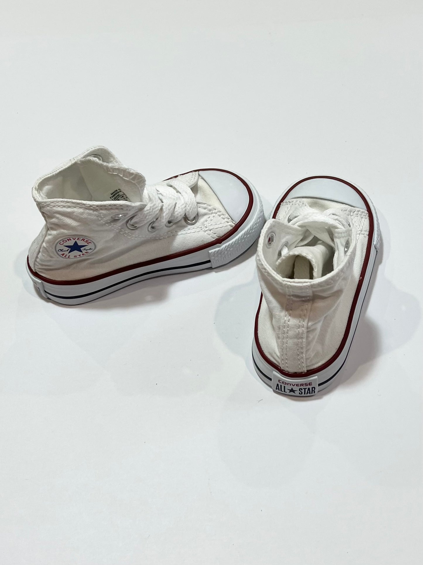 White hi-top Chuck Taylors - Size US5