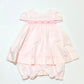 Pink smocked romper - Size 0