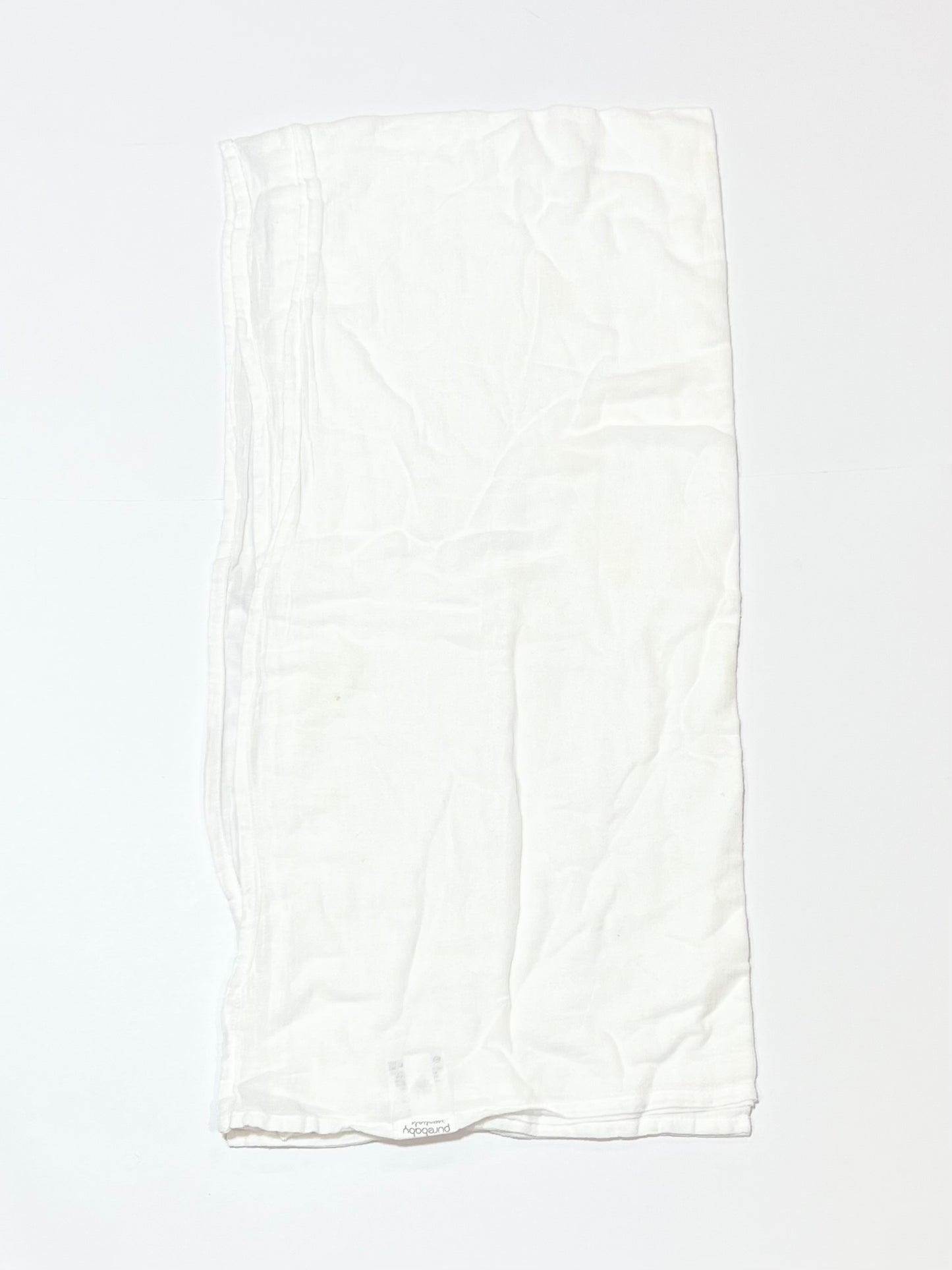 White muslin wrap