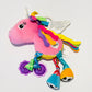 Colourful unicorn pram toy