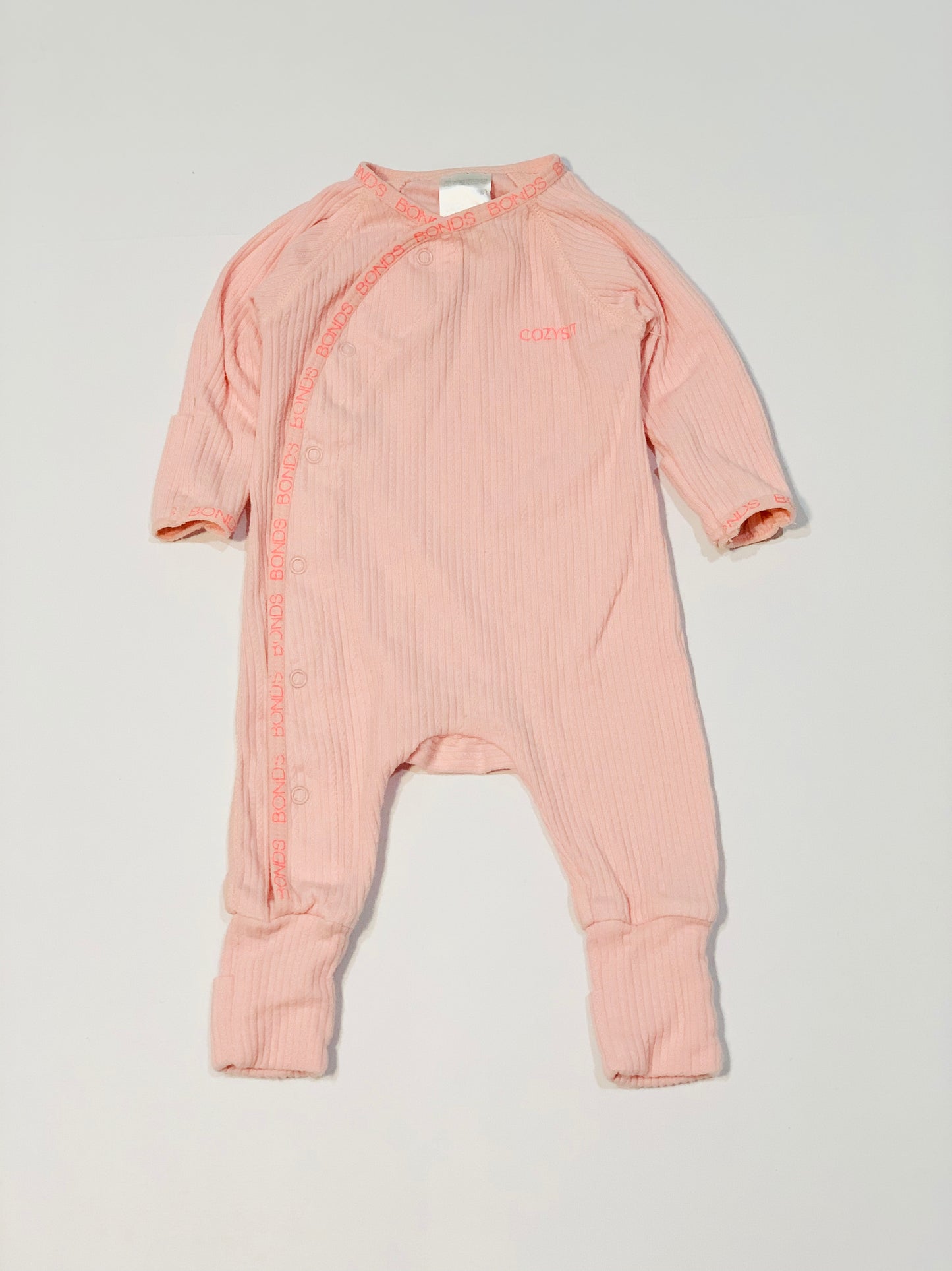 Pink ribbed Cosysuit - Size 0000