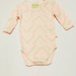 Pink pattern bodysuit - Size 0000