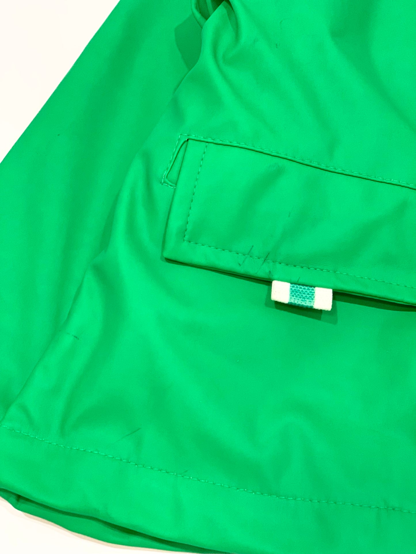 Green raincoat - Size 1-2